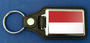 Indonesien Schlüsselanhänger aus Metall und Kunstleder | ca. 95 X 37  mm