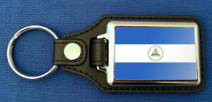 Nicaragua Schlüsselanhänger aus Metall und Kunstleder | ca. 95 X 37  mm